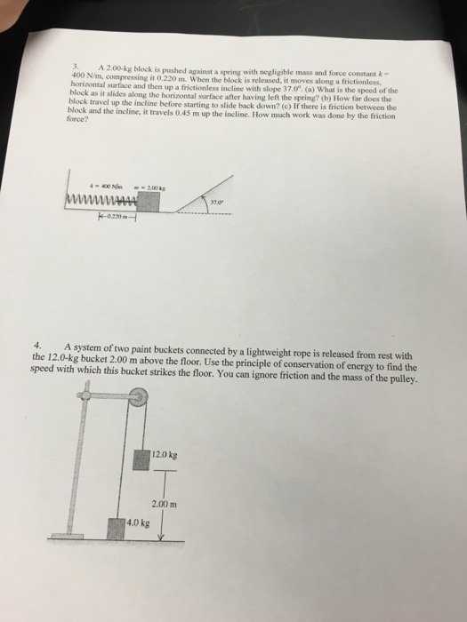 Solved A 2 00 Kg Block Is Pushed Against A Spring With Chegg