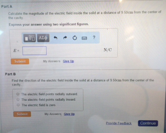 Solved A Point Charge Of Mu C Is Located In The Center Chegg