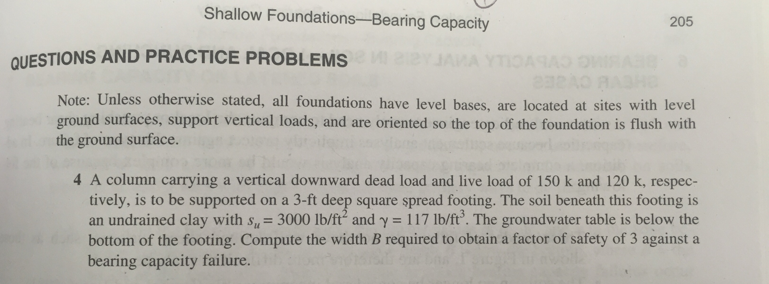 A column carrying a vertical downward dead load an