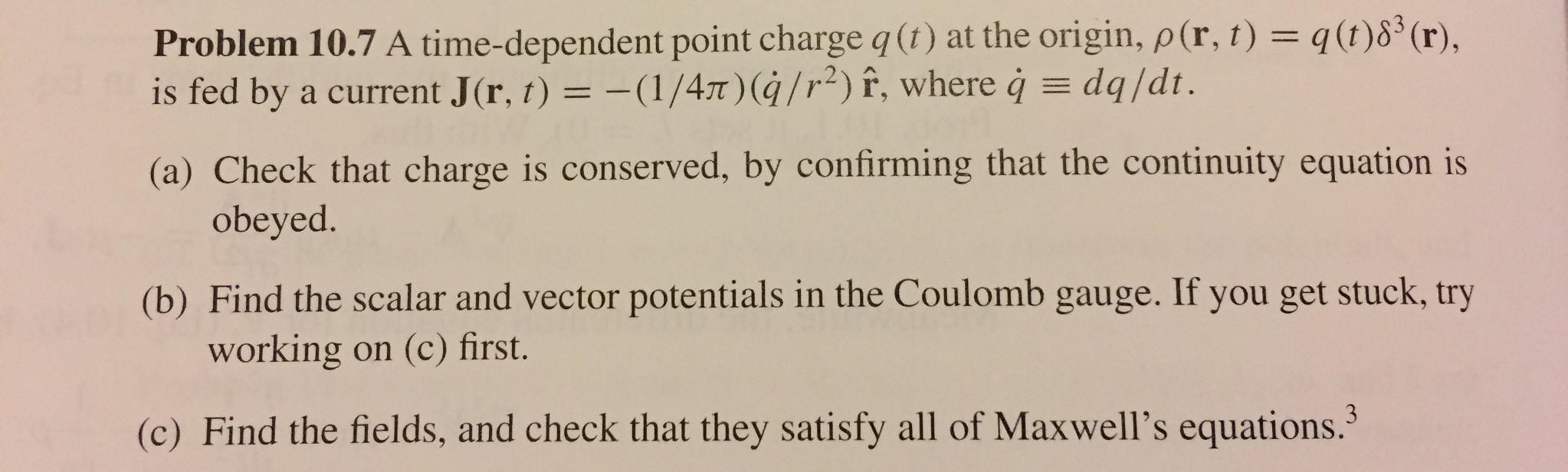 Solved A Time Dependent Point Charge Q T At The Origin Chegg Com