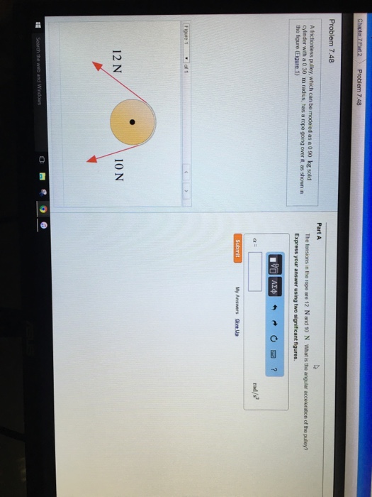 Solved A frictionless pulley, which can be modeled as a 0.90