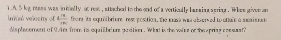 Solved A 5 kg mass was initially at rest, attached to the | Chegg.com