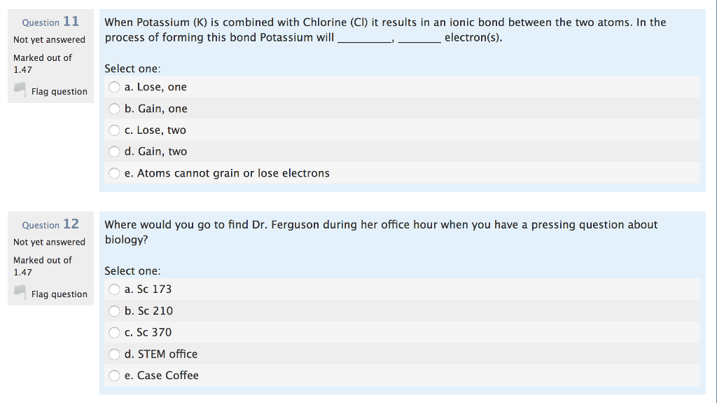 what subatomic particle determines the net charge of an atom