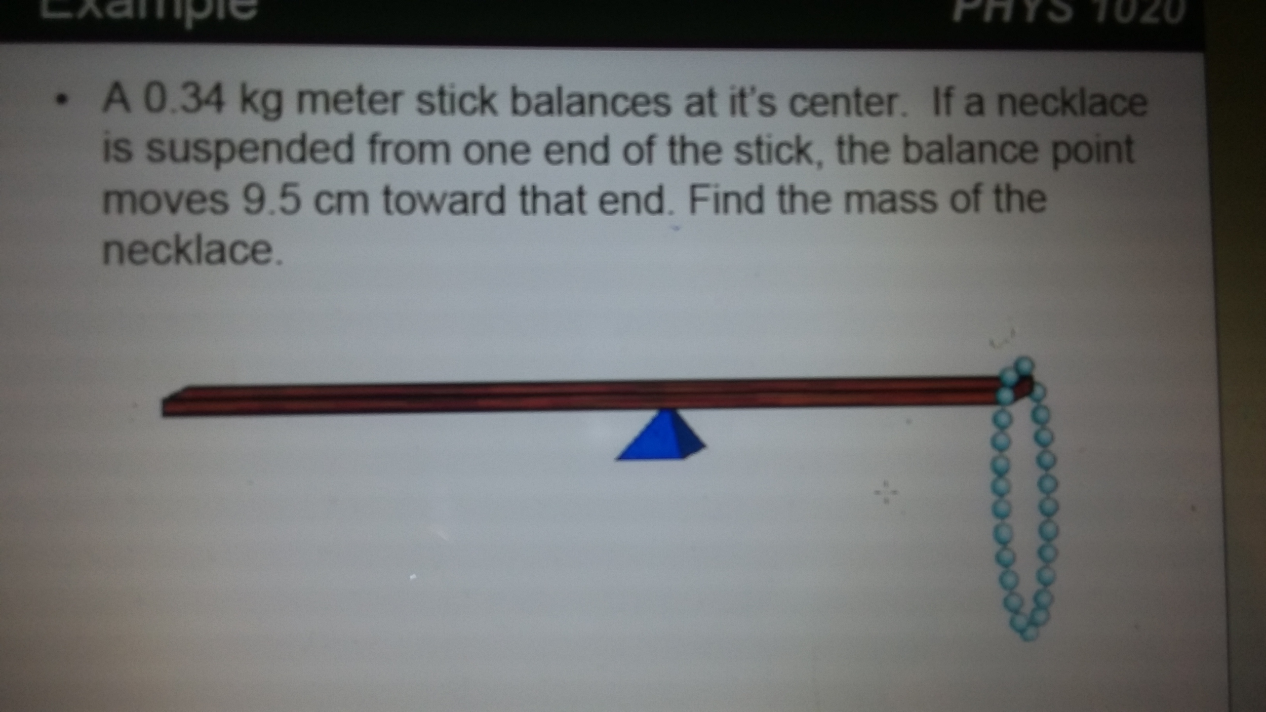 Solved A 0.34 kg meter stick balances at it's center. If a