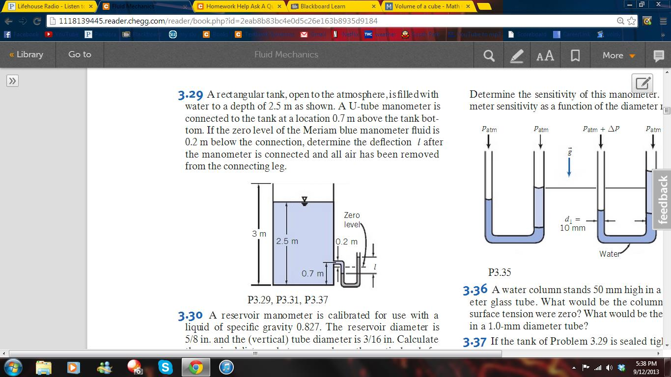 A rectangular tank, open to the atmosphere, is filled