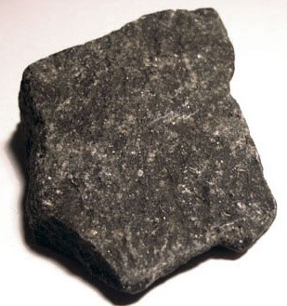 Solved \ Dark colored rock, finely crystalline but no