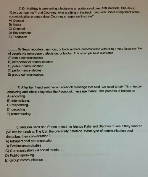 Dr. Halliday is presenting a lecture to an audience